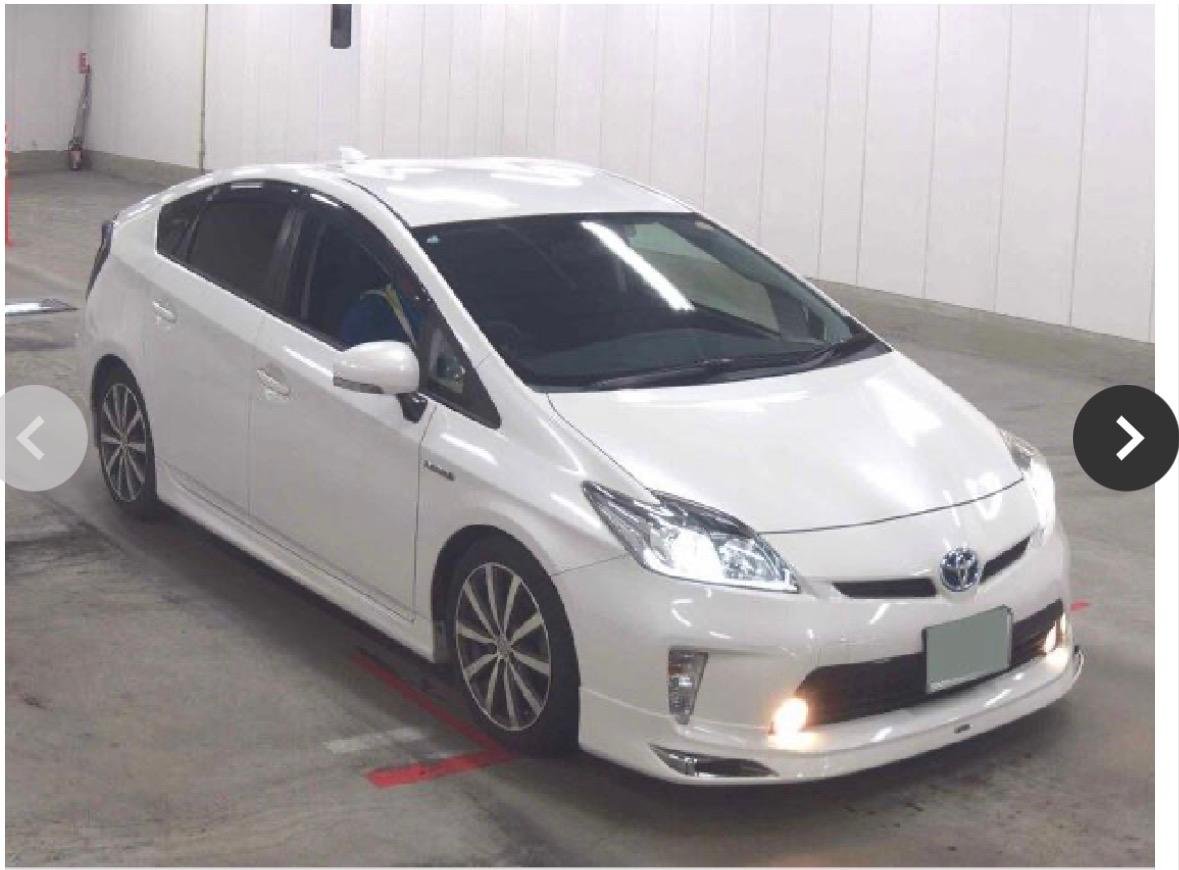 
Toyota Prius 2014 White Pearl full									